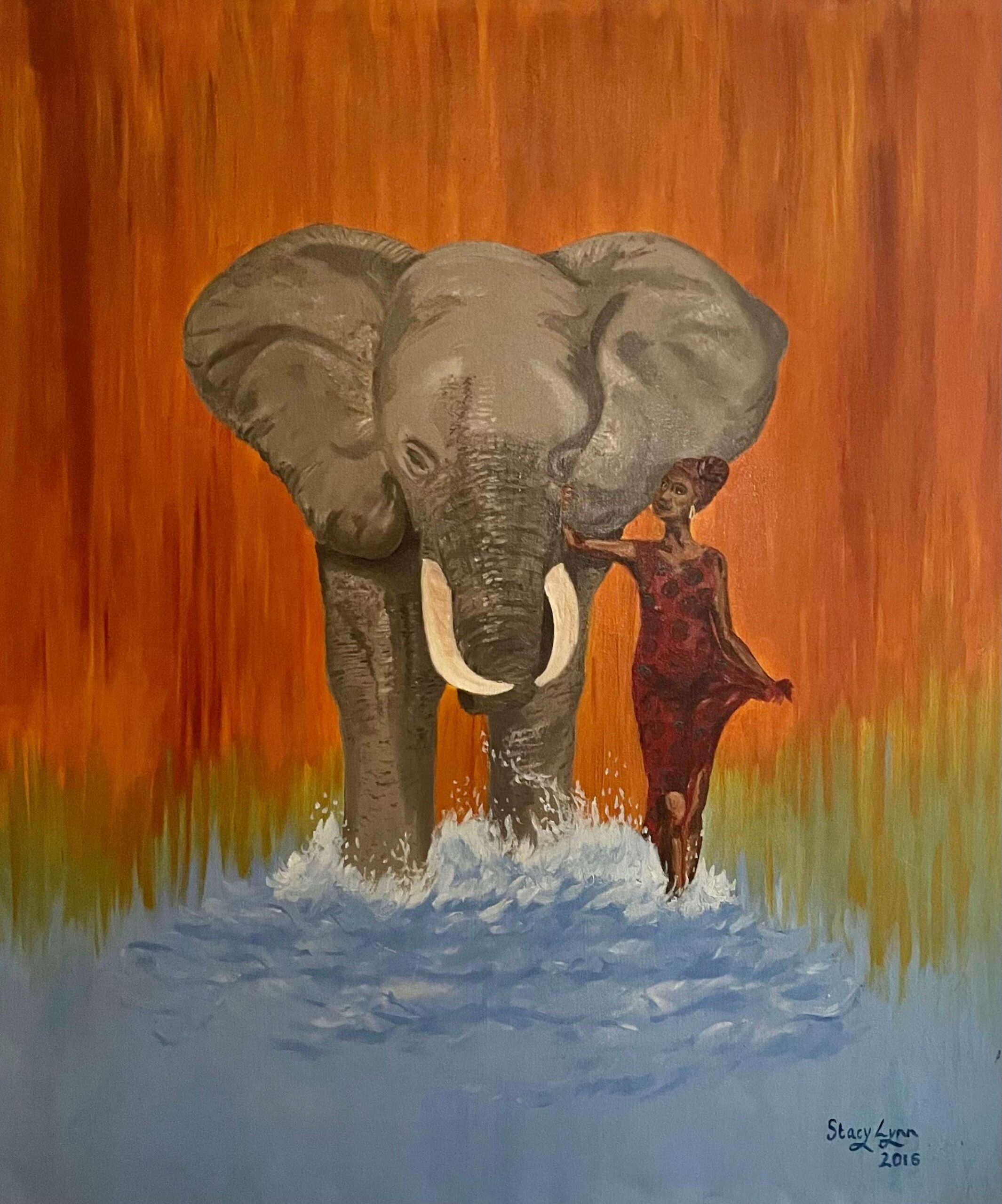 Elephant and woman walking through water